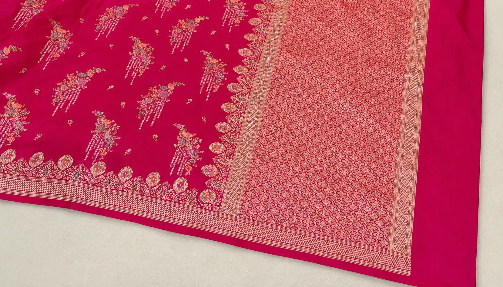 Full pink Katan silk Banarasi saree showing Kadwa boota body, border and pallu
