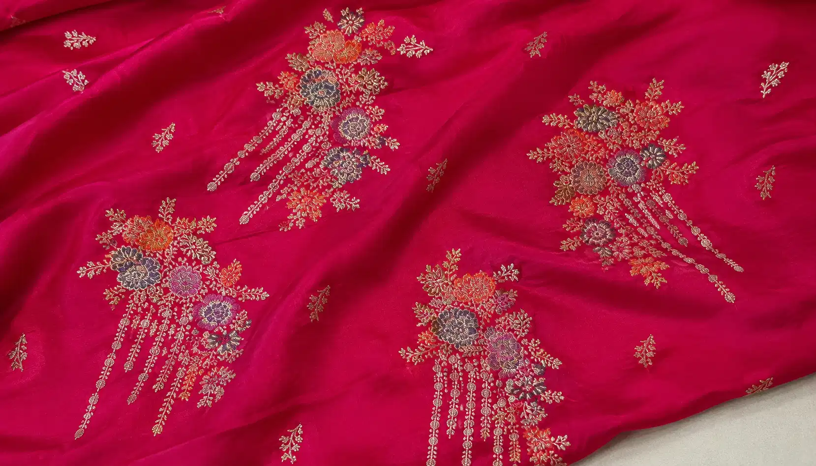 Kadwa floral boota close-up on pink Katan silk Banarasi saree
